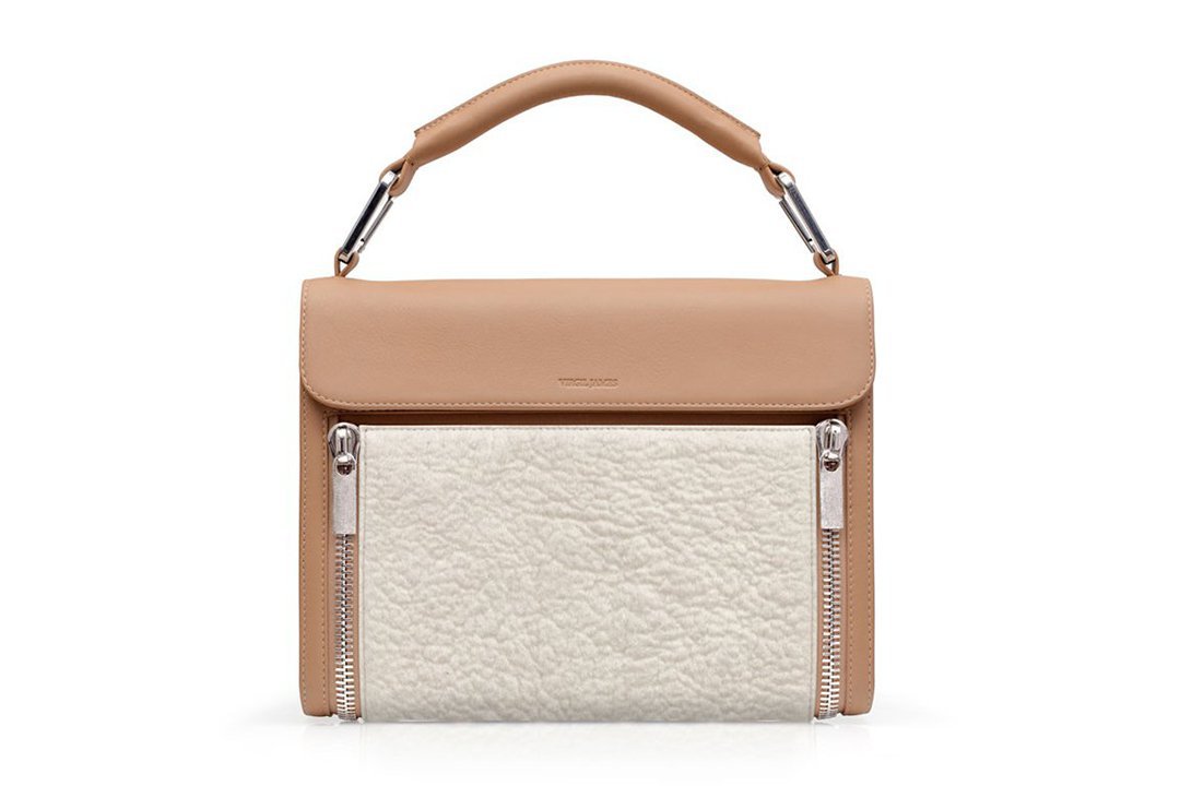 The Naturale Classic with our iconic No. 8 bag style features butter-smooth tan Italian calfskin.