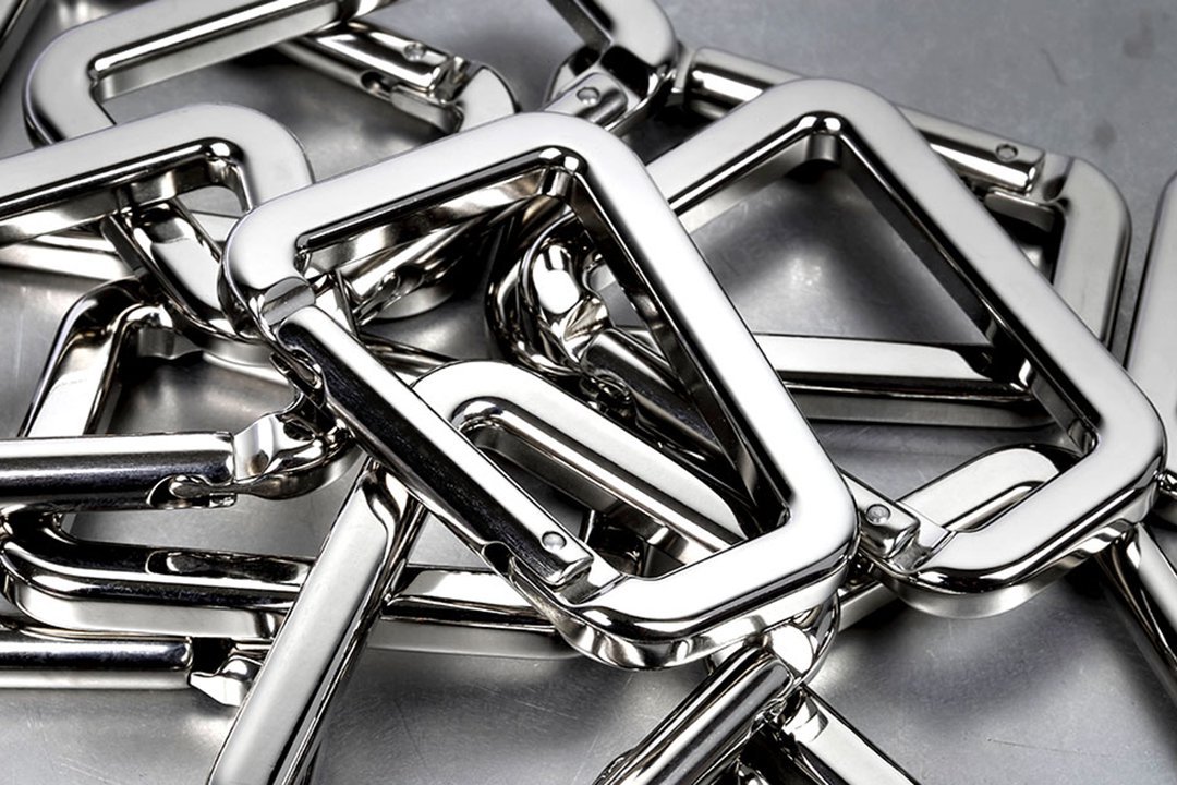 Our high-strength, removable carabiners that are used to attach the hand and shoulder straps to our bags.
