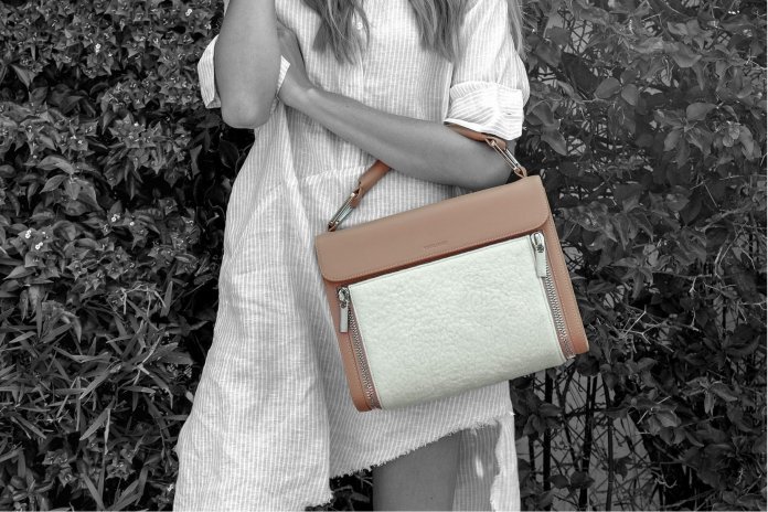 This Naturale Classic bag features a removable white cashmere felt panel, handmade in Mongolia for Virgil James.